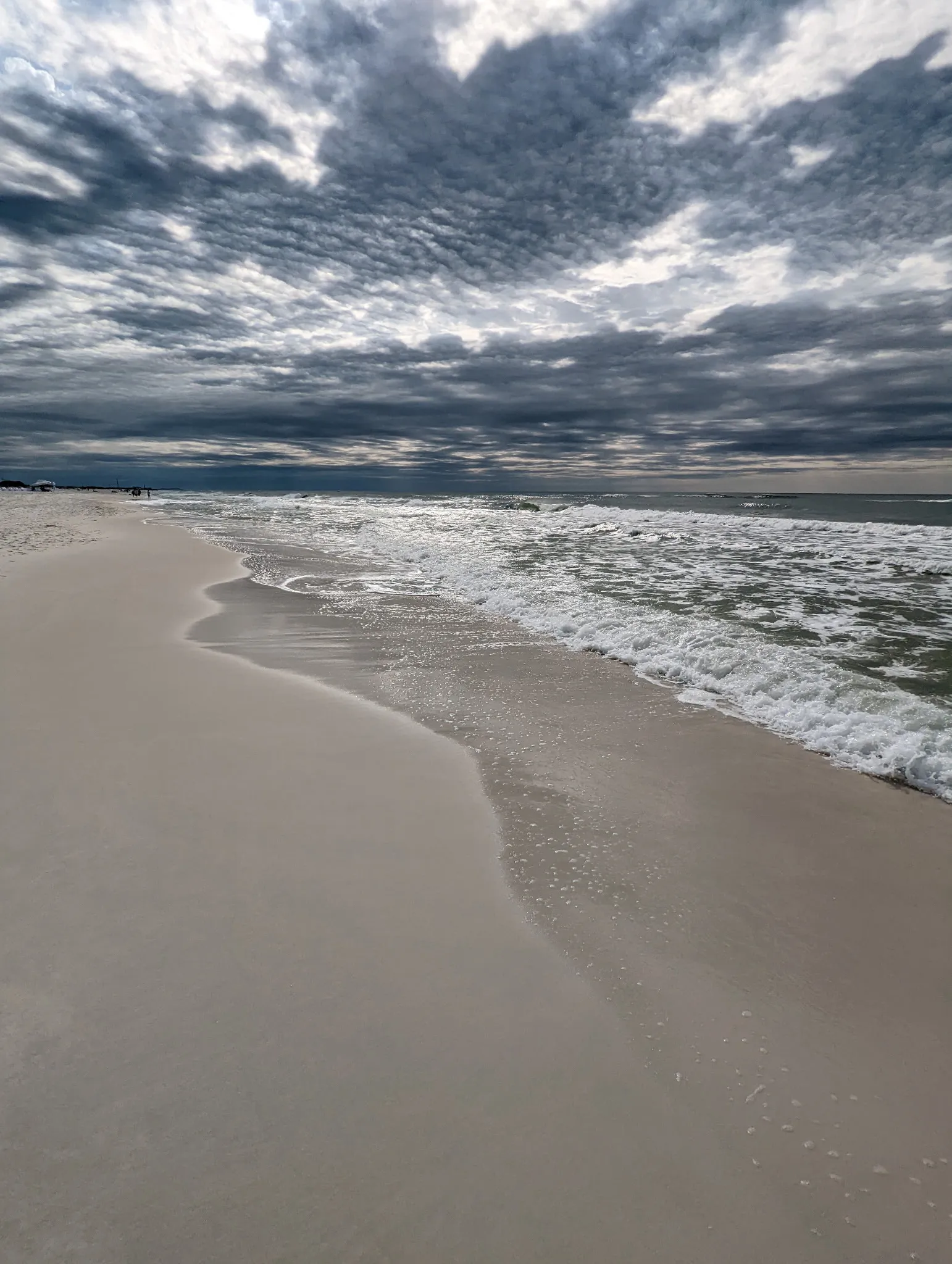 Dramatic clouds over a coastal shoreline